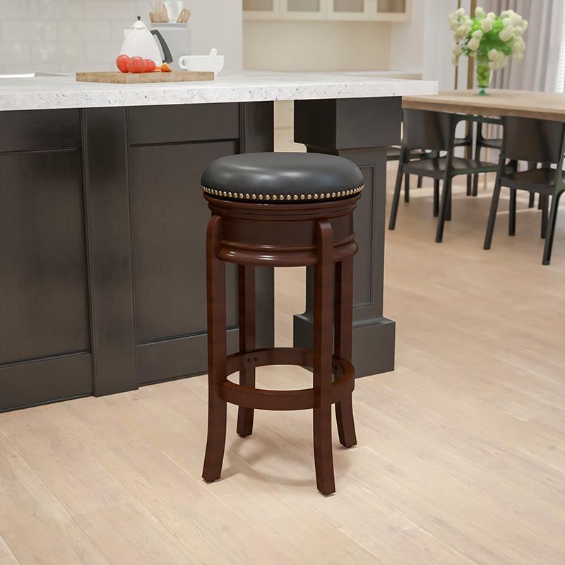 29'' High Cappuccino Wood Barstool with Carved Apron and Black Swivel Seat