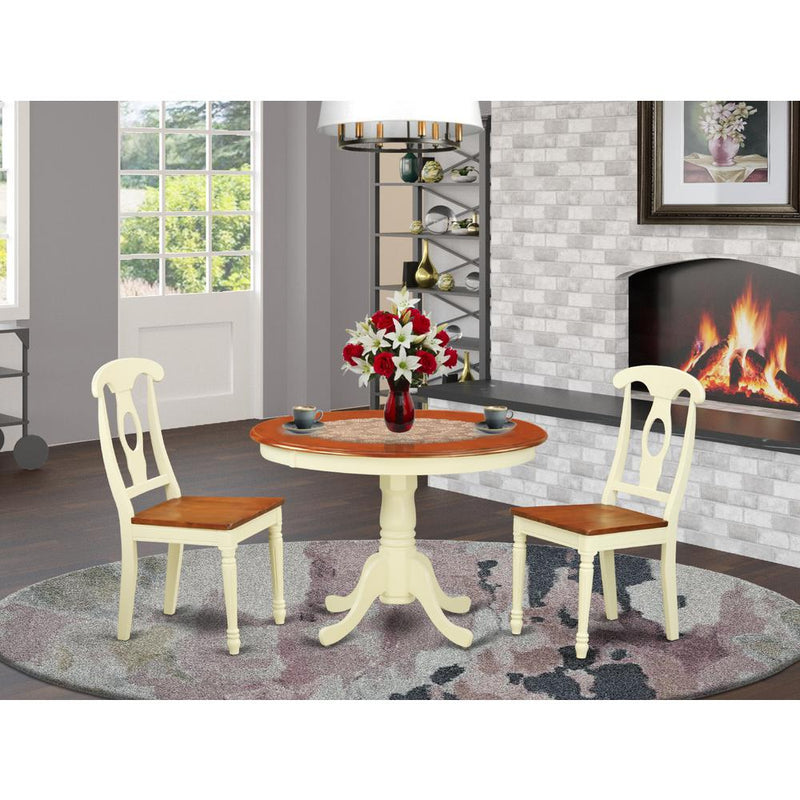 3  Pc  set  with  a  Round  Kitchen  Table  and  2  Wood  Dinette  Chairs  in  Buttermilk  and  Cherry  .