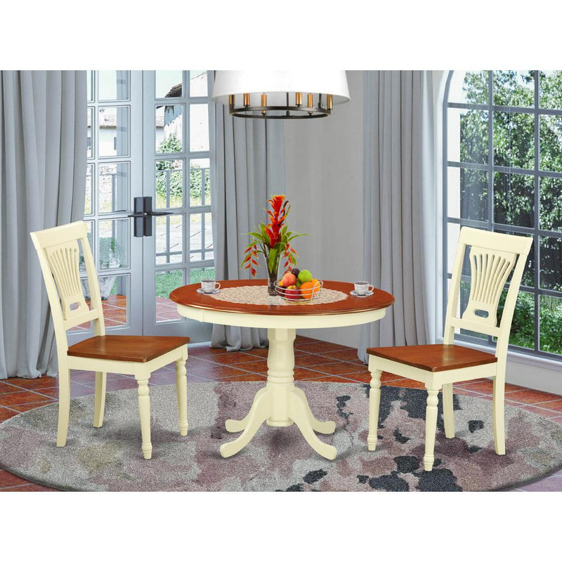 3  Pc  set  with  a  Round  Dinette  Table  and  2  Wood  Dinette  Chairs  in  Buttermilk  and  Cherry  .