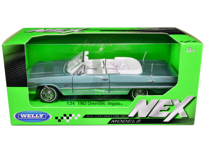 1963 Chevrolet Impala Convertible Light Blue Metallic with White Interior NEX Models 1/24 Diecast Model Car by Welly