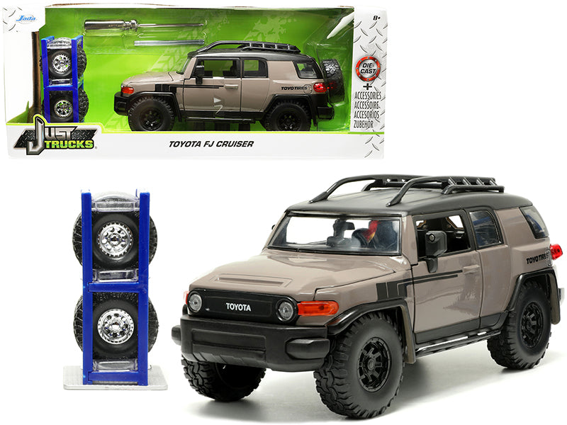 Toyota FJ Cruiser with Roof Rack Brown and Black Toyo Tires with Extra Wheels Just Trucks Series 1/24 Diecast Model Car by Jada