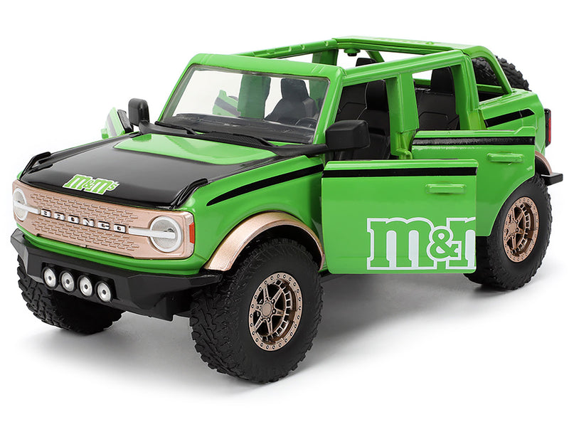 2021 Ford Bronco Green with Black Stripes and Green M&M's Diecast Figure "Hollywood Rides" Series 1/24 Diecast Model Car by Jada