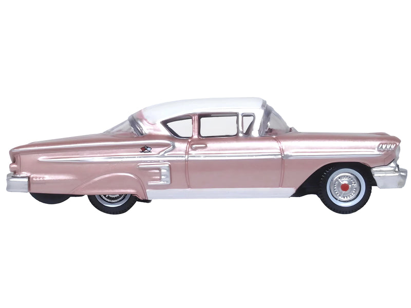 1958 Chevrolet Impala Sport Cay Coral Pink Metallic with White Top 1/87 (HO) Scale Diecast Model Car by Oxford Diecast