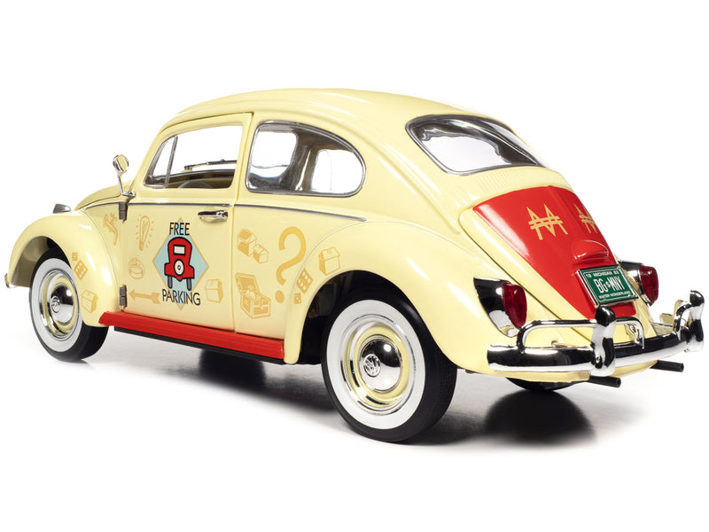 1963 Volkswagen Beetle Yukon Yellow with Monopoly Graphics Free Parking and Mr. Monopoly Resin Figure 1/18 Diecast Model Car by Auto World