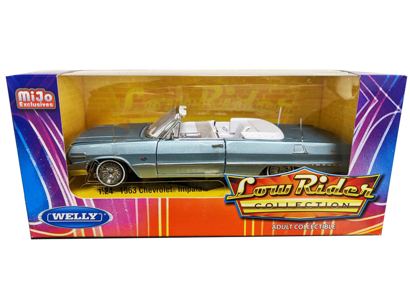 1963 Chevrolet Impala Convertible Lowrider Light Blue Metallic with White Interior Low Rider Collection 1/24 Diecast Model Car by Welly